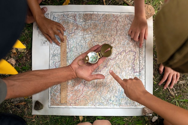 Scouts playing with map top view