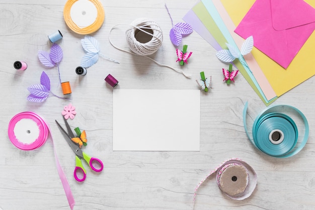 Scrapbooking cards with decorative elements on white textured backdrop