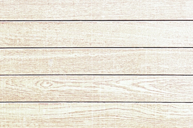 Foto gratuita fondo strutturato di legno beige graffiato