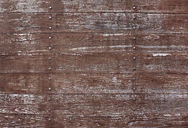 Scratched brown wooden textured flooring background