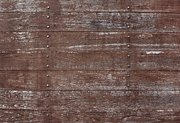 Почесал коричневый деревянный текстурированный пол фон