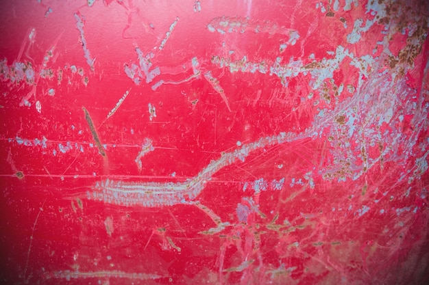 Scratches on red metal background