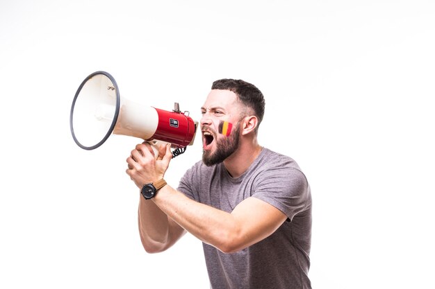 Scream on megaphone Belgium football fan in game supporting of Belgium national team on white background. Football fans concept.