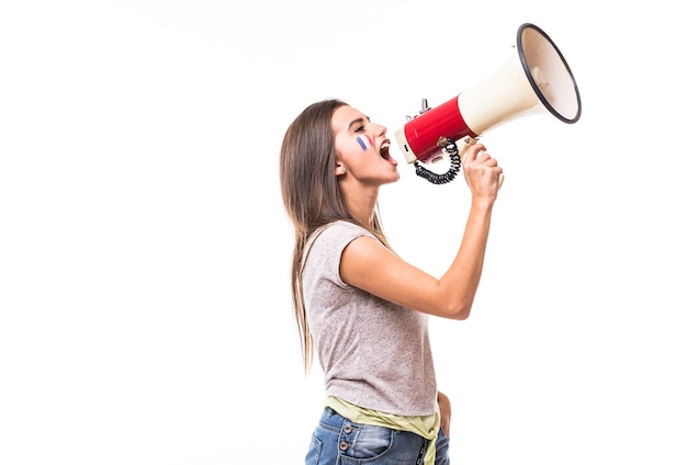 Free photo scream on megaphone france woman football fan in game supporting of france national team on white background. football fans concept.