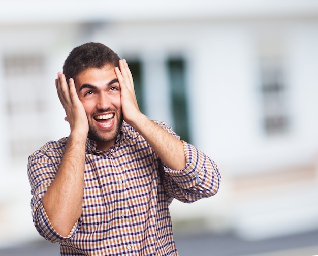 Screaming arab on the urban blurred background