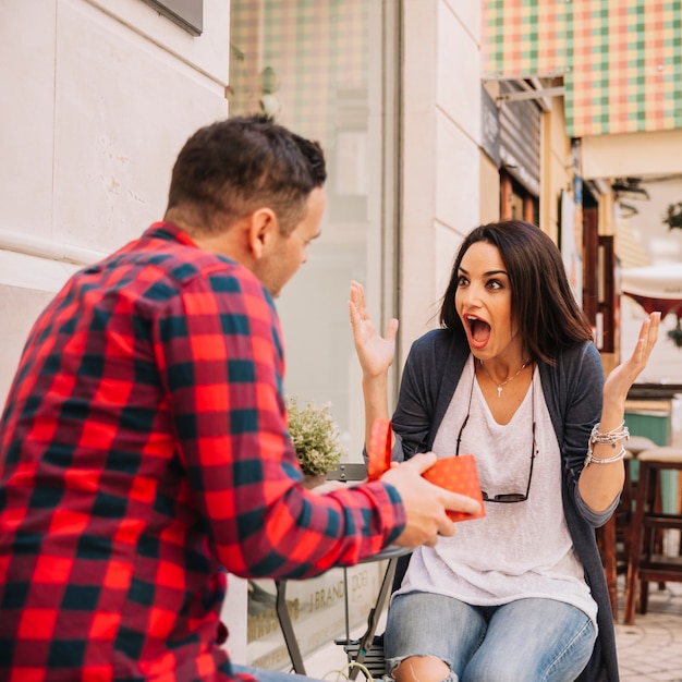 Screaming girlfriend getting present