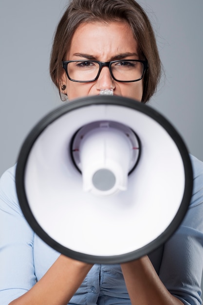 Screaming and very angry businesswoman