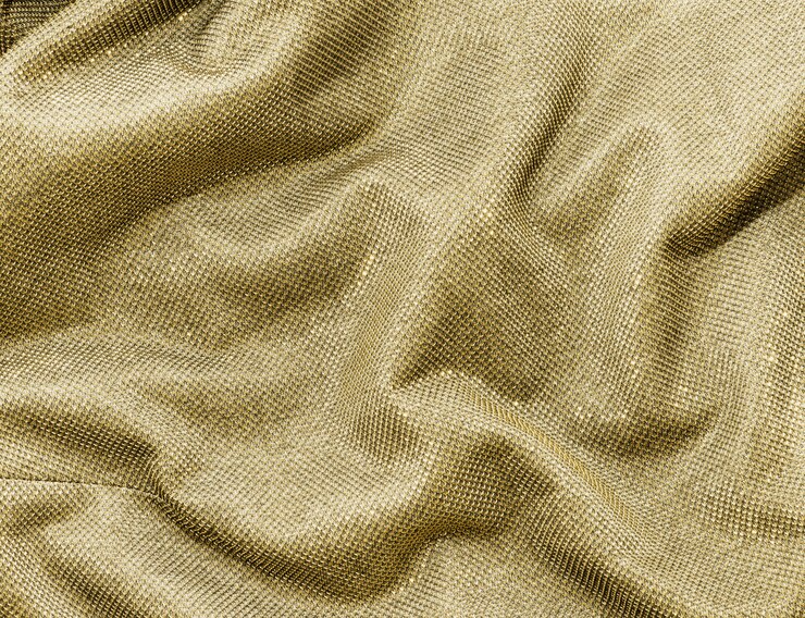 Free Photo scrunched gold fabric