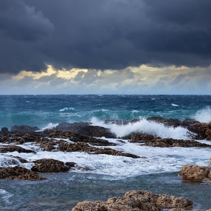 Free Photo sea wave breaking against coast  rock