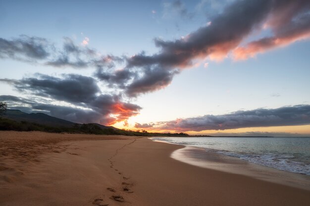 Sea Waves Crashing on Shore during Sunset