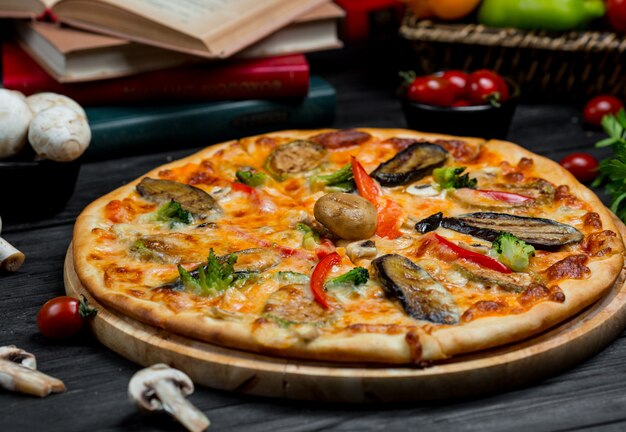 Seafood pizza with tomato sauce and variety of seafood selection