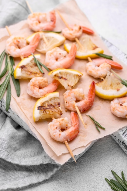 Free photo seafood shrimp skewers high view