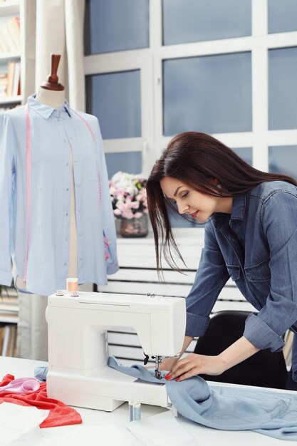 Seamstress working in studio