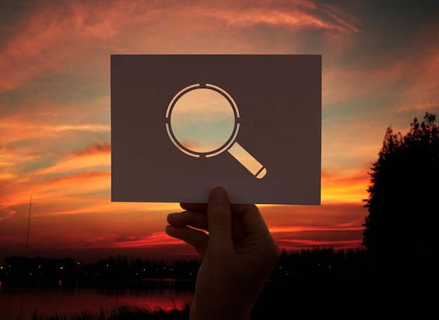 Searching discovery perforated paper magnifying glass Free Photo