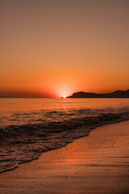 Seascape with Clear Sky and Waves at Sunset: Free Stock Photo
