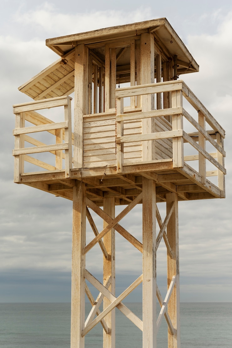 Free Photo seaside view with lifeguard tower