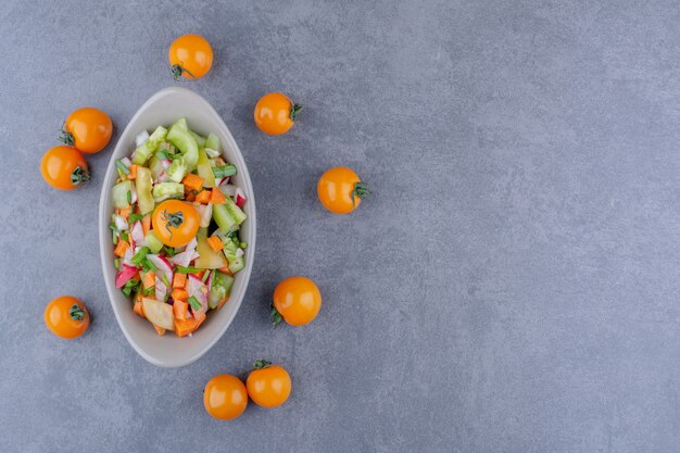 Seasonal mixed vegetable salad in a plate