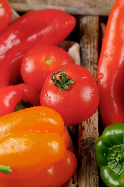 Seasonal vegetables in a rustic tray. Top view.