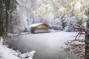 Free photo secluded mountain lake freezes over in the winter and creates magical moments.