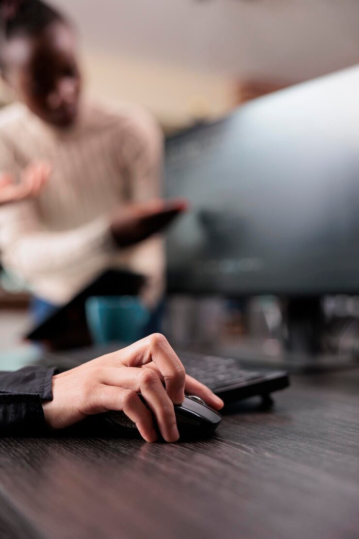 Free Photo security application engineer hand encrypting vital company information on blockchain system. neural network programmer developing artificial intelligence data processor. close up.