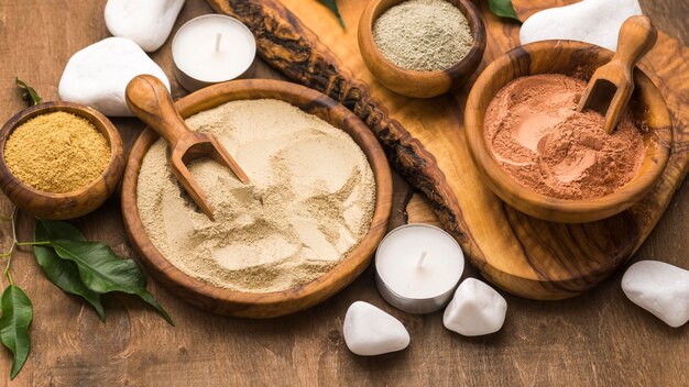 Selection of fine powders in bowls with scoops