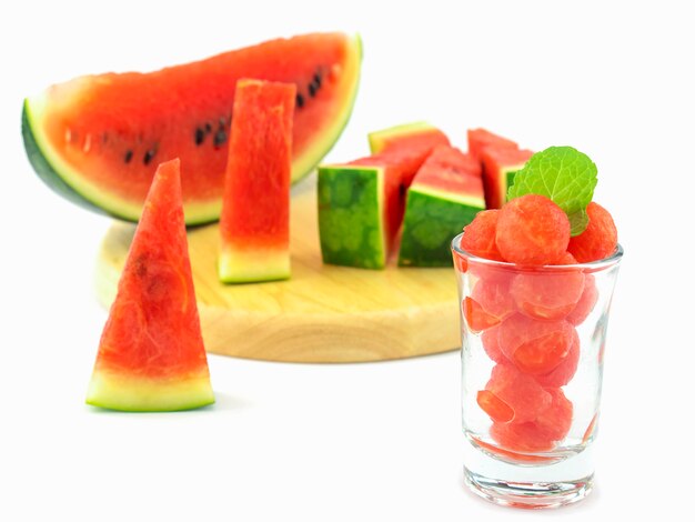 Selective focus of fresh watermelon in a glass with mint decoration 