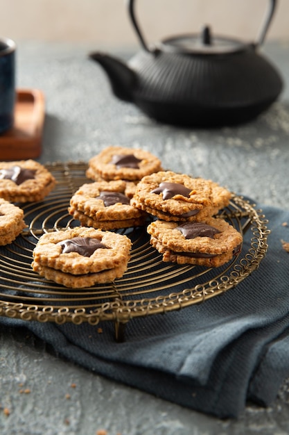 Selective focus shot of appetizing homemade chocolate cookies on a metal tray