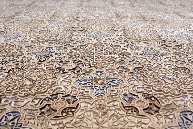 Selective focus shot of a carving of Real Alcazar, Spain