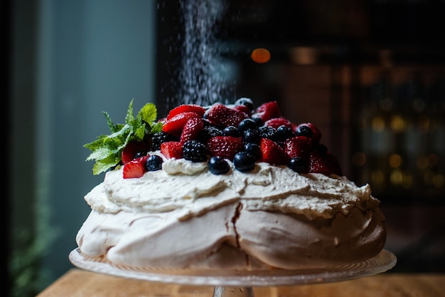 Selective focus shot of delicious dessert Pavlova