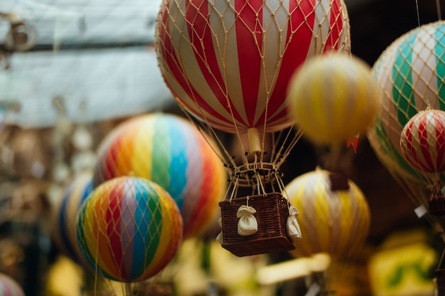 Selective focus shot of a lot of colorful air balloons