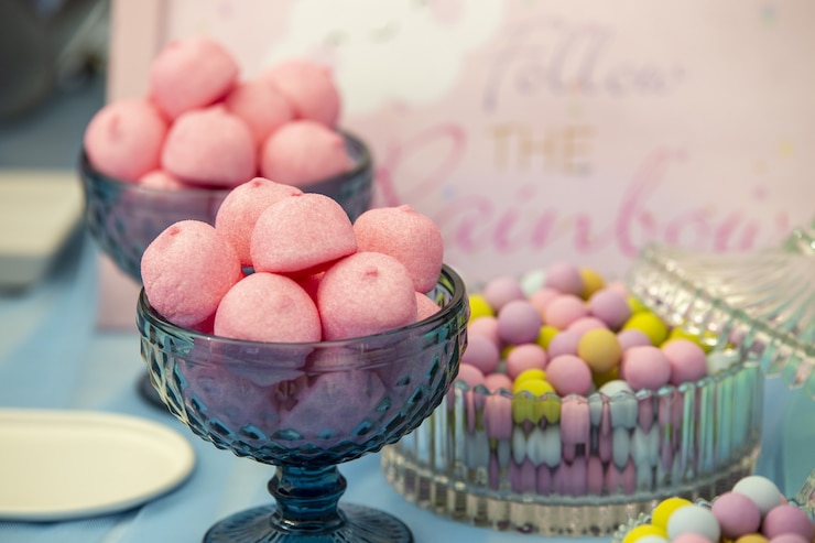 Free Photo selective focus shot of pink marshmallows in a glass bowl