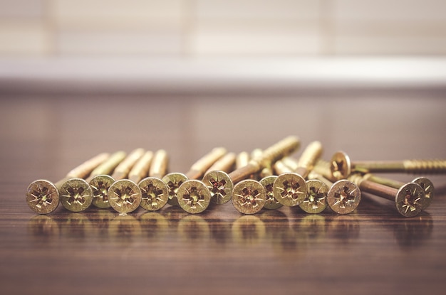 Free photo selective focus shot of screwdrivers on a wooden surface