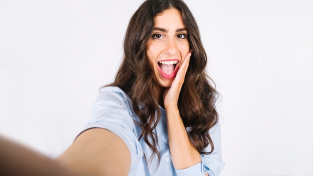 Free photo selfie of surprised woman