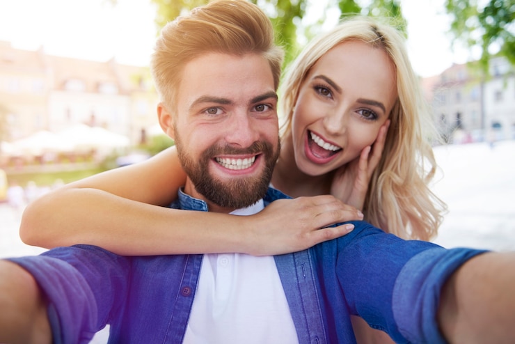 Free Photo selfie taken by happy young couple