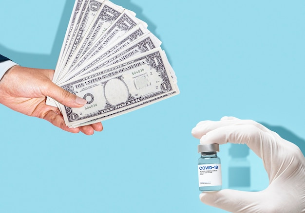 Free photo selling the covid-19 vaccine, vaccine bottle and money