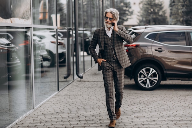 Free Photo senior business man talking on the phone