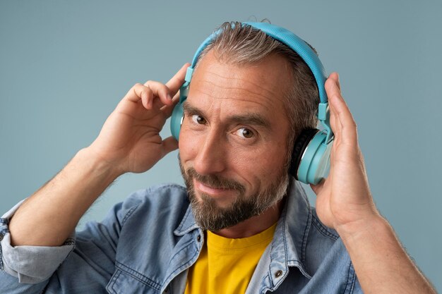 Senior businessman listening to music