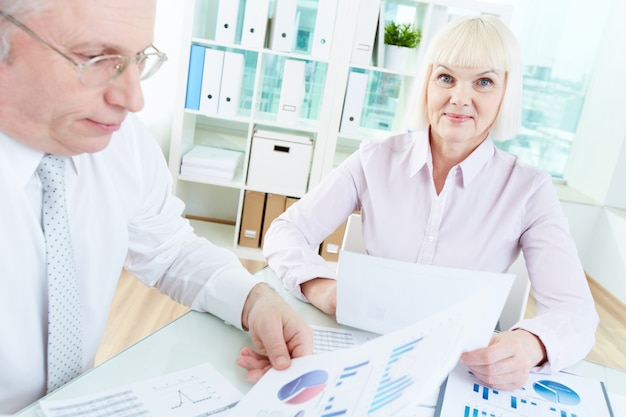 Senior businesswoman holding a document