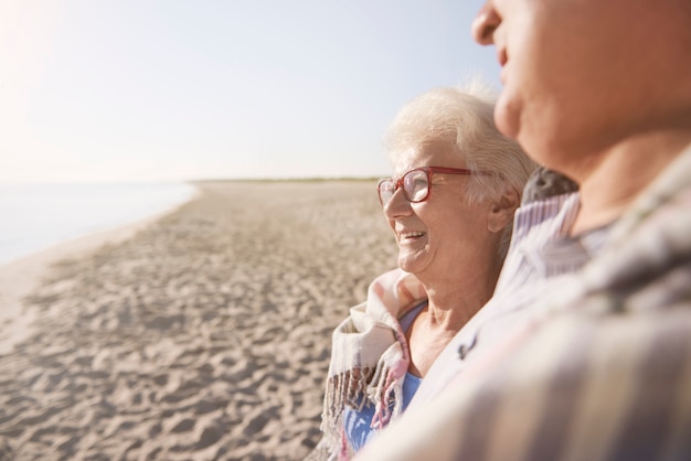 Senior couple in the beach, retirement and summer vacation concept