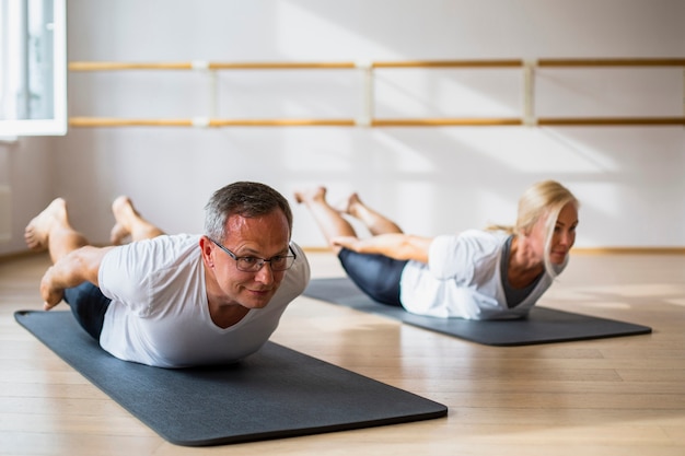 Senior couple doing exercises together