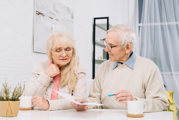 Senior couple doing paperwork