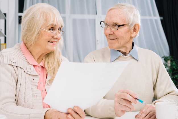 Senior couple doing paperwork