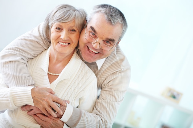 Senior couple embracing each other