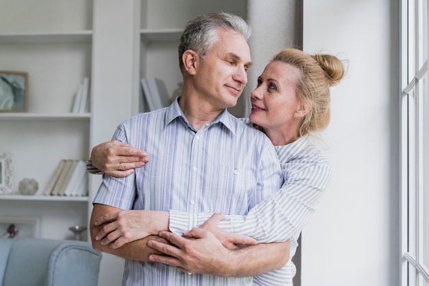 Senior couple hugging each other