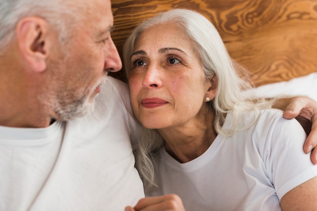 Senior couple looking at each other