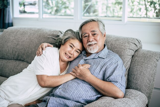 Senior couple Playing together at living room