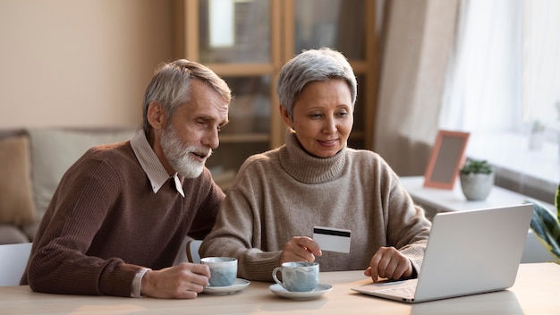 Senior couple shopping online