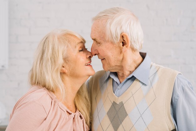 Senior couple together in kitchen