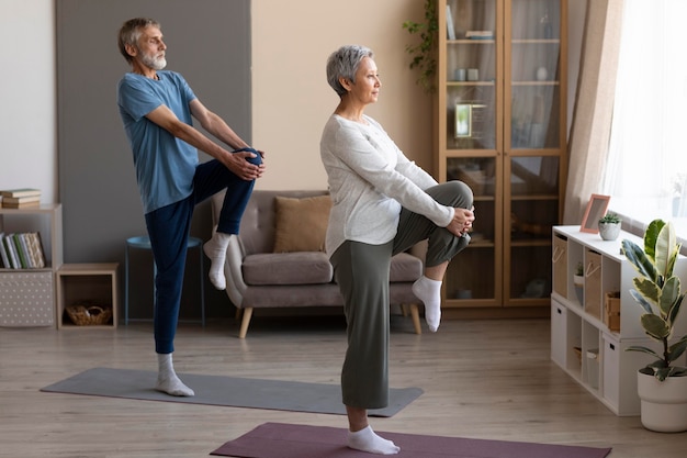 Senior couple training at home