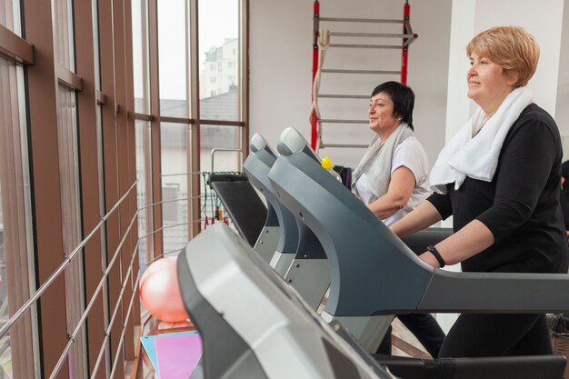 Senior couple on treadmill